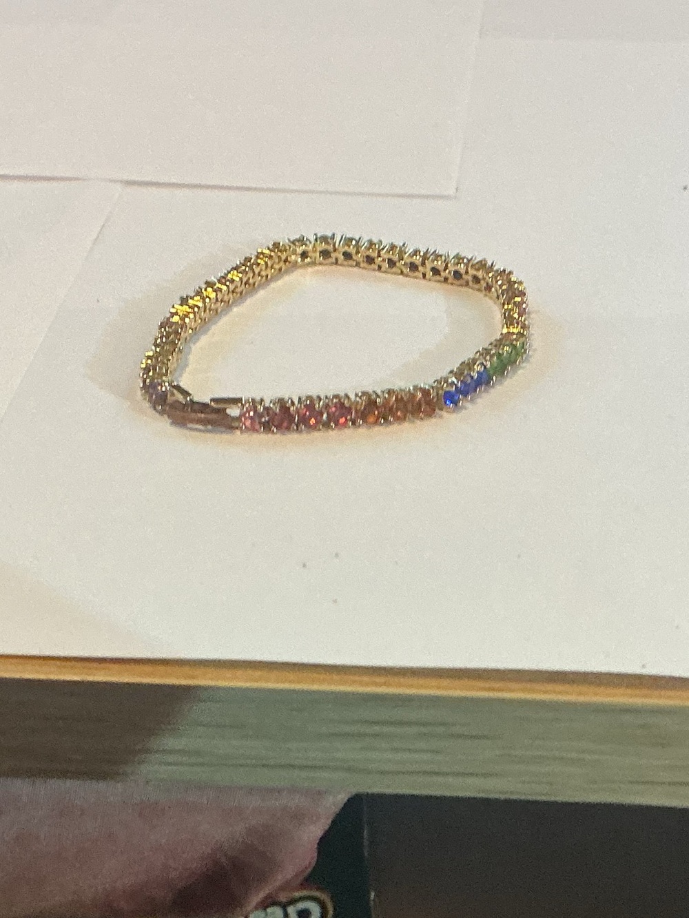 Tennis Bracelet with multiple colored stones.